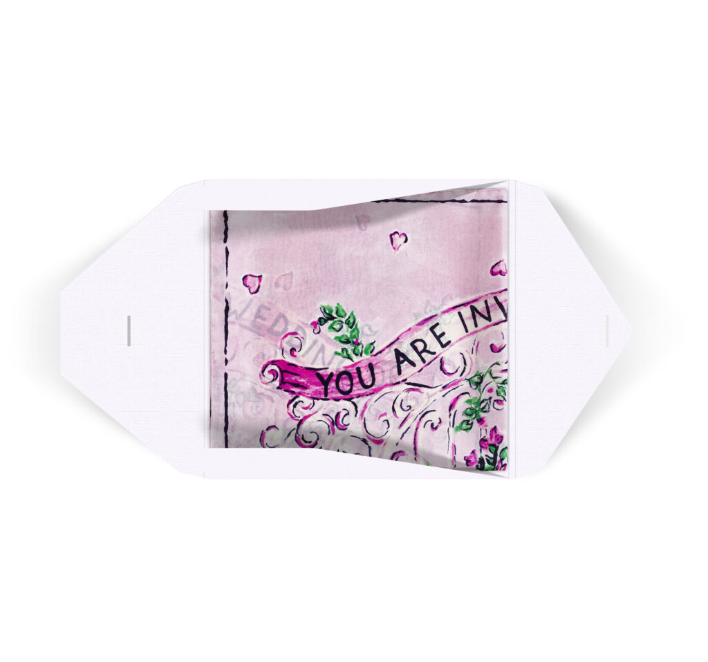 A pink Lago di Como silk scarf folded into its white envelope, the invitation wording showing